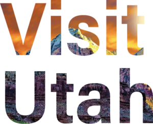 The words "visit Utah" with mountains in the background.
